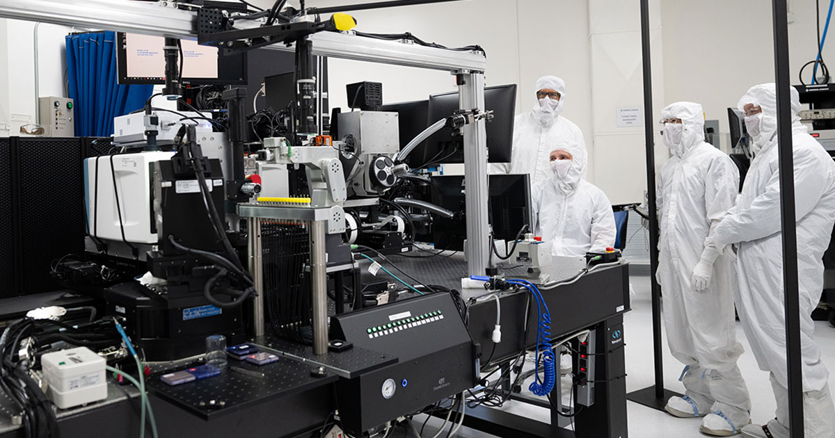 Members of the Metrology Research and Development team working with the 4Pi system in a clean room at General Atomics headquarters. Credit: General Atomics